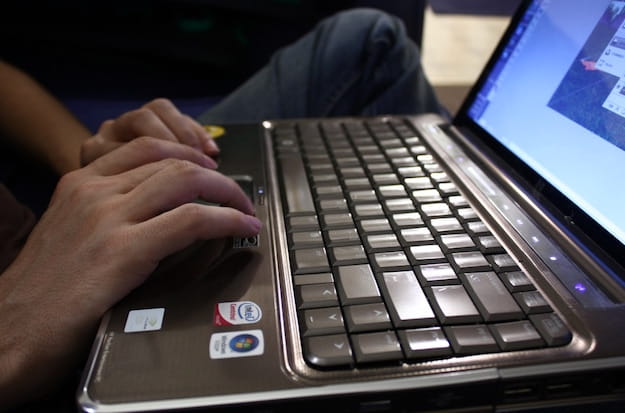 Photo of a user using a Windows laptop computer